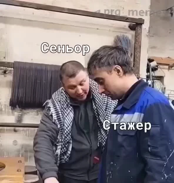 Two men in a workshop with text overlay