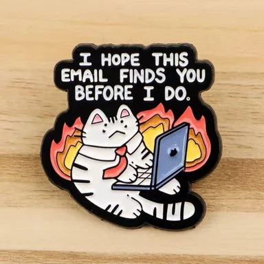 cat sitting at a laptop with flames behind it and the text 'I hope this email finds you before I do'