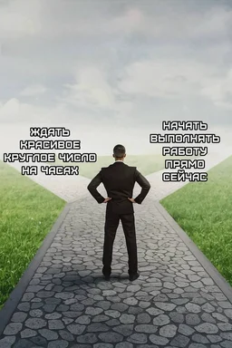 Man in a suit standing on a path with two options