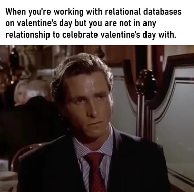 Sad man in a suit looking dejected on Valentine's Day, relational databases meme