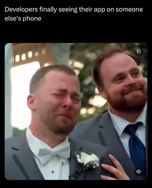 Two men in suits reacting with surprise and delight