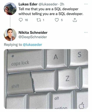 a close-up of a keyboard with a cracked keycap
