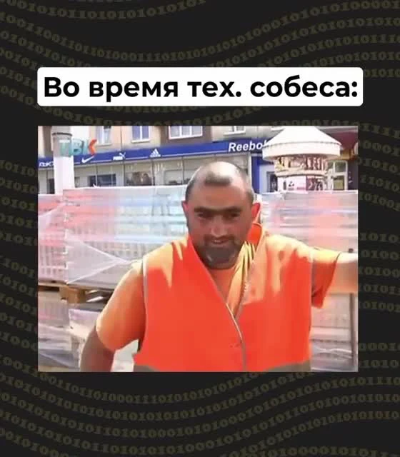 Man in orange shirt with a serious expression
