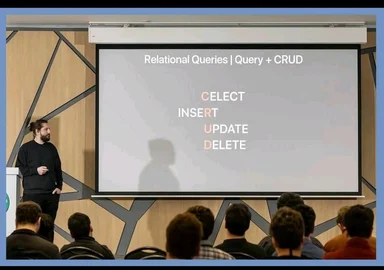 programmer giving presentation with typo on slide