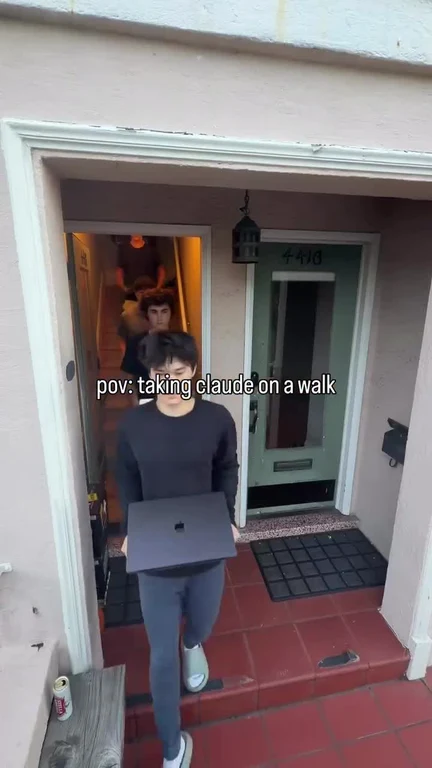 A person walking out of a doorway carrying a laptop with the caption 'pov: taking claude on a walk', followed by a line of other people.