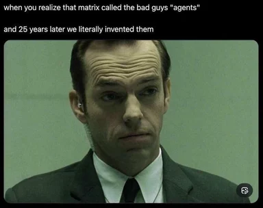 Hugo Weaving as Agent Smith from The Matrix looking serious, with text overlay about the movie predicting AI agents.