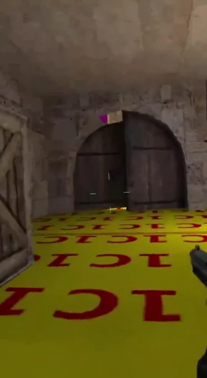 Video game screenshot with a floor texture glitch showing repeated red text