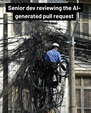 A worker in a blue shirt and white hard hat climbs a utility pole buried under a chaotic tangle of black cables, captioned