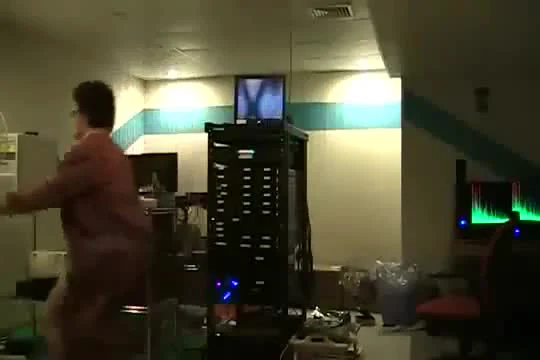 Man running away from server rack in office