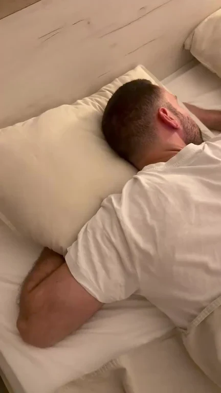 Man sleeping on a couch representing burnout