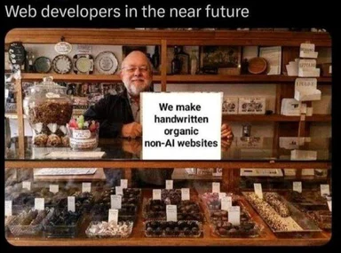 man holding sign that says 'We make handwritten organic non-AI websites'