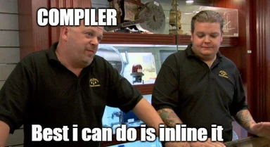 Two men in black shirts discussing compiler optimization