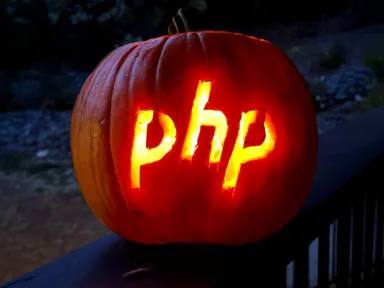 Glowing jack o'lantern with php carved into it