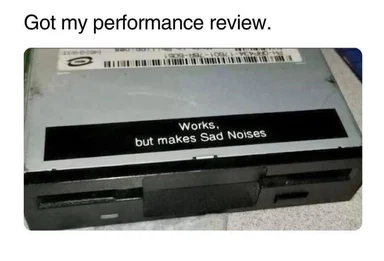 Hard drive with sticker saying 'Works, but makes Sad Noises'