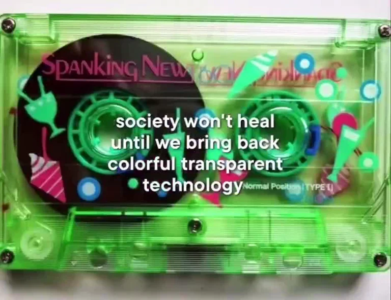 a green cassette tape with colorful transparent technology components and the text 'society won't heal until we bring back colorful transparent technology'