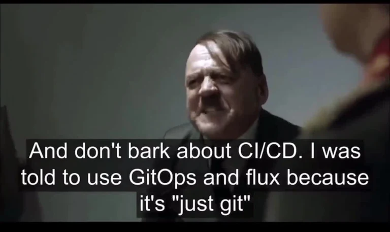A man in a suit with a skeptical expression, overlaid with text about GitOps and CI/CD.