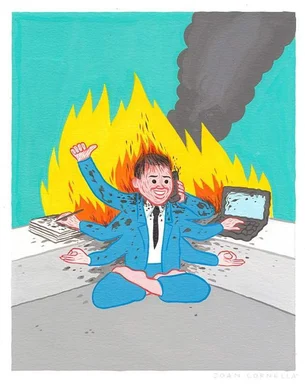 Cartoon man in blue suit sitting cross-legged on floor with laptop and papers on fire behind him