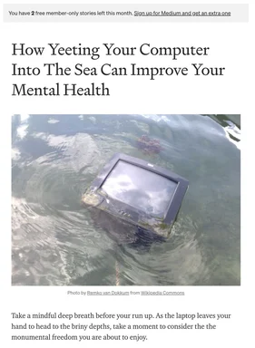 A laptop floating in the sea with text about yeeting computers for mental health