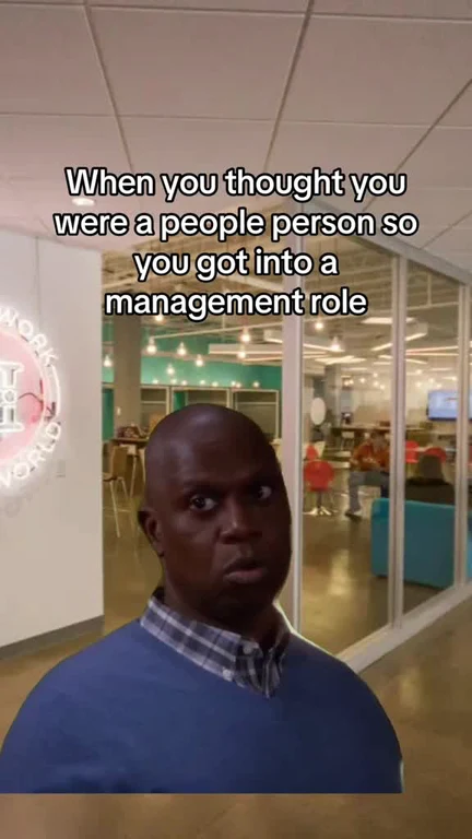 Man with a skeptical expression and text overlay about management role