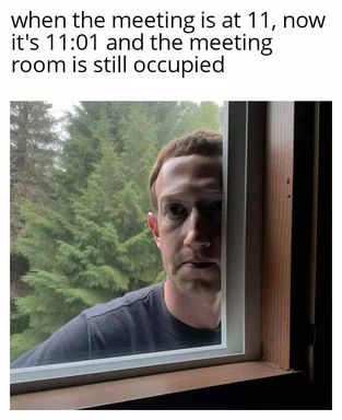 man looking through window with worried expression