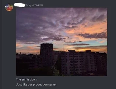 Sunset over cityscape with caption about production server