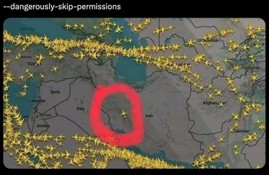 Map with a red circle around Iran and a single plane inside, surrounded by many planes outside