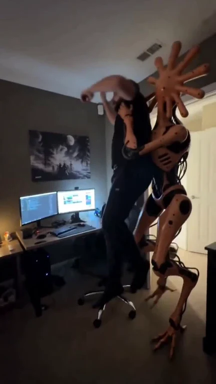 programmer dancing with robot