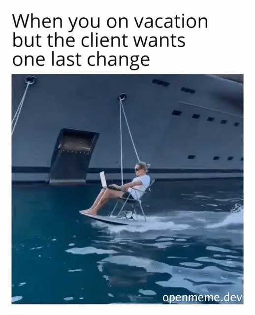 man on vacation working on laptop while sitting on a swing over water with a cruise ship in the background