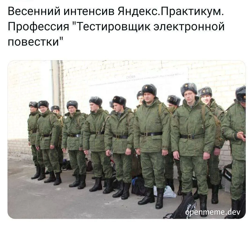 Soldiers in green uniforms and black helmets standing in formation