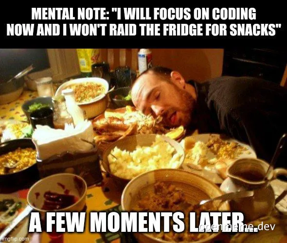 man eating from a table full of food with a guilty expression