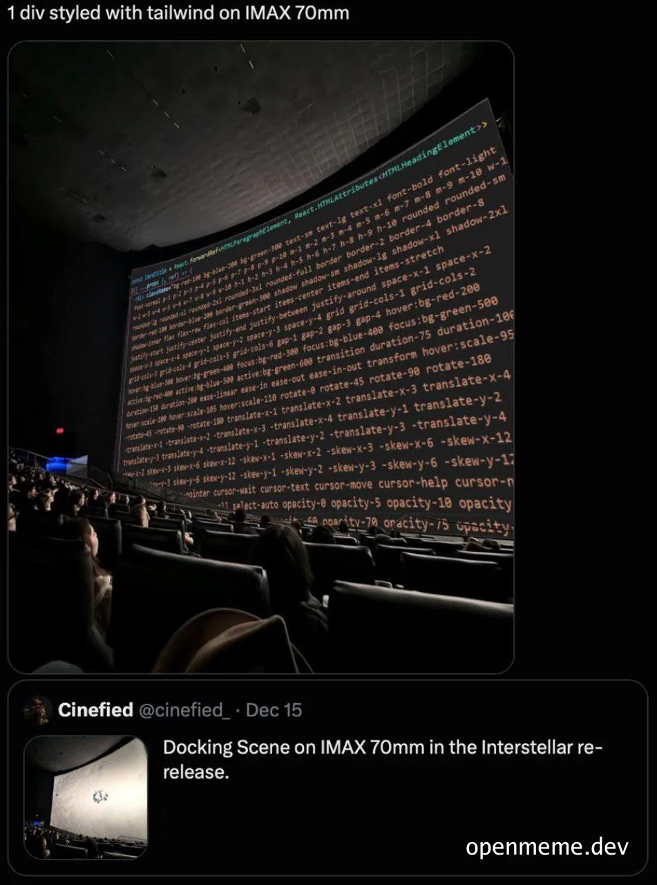 a large movie screen in a cinema with code on it