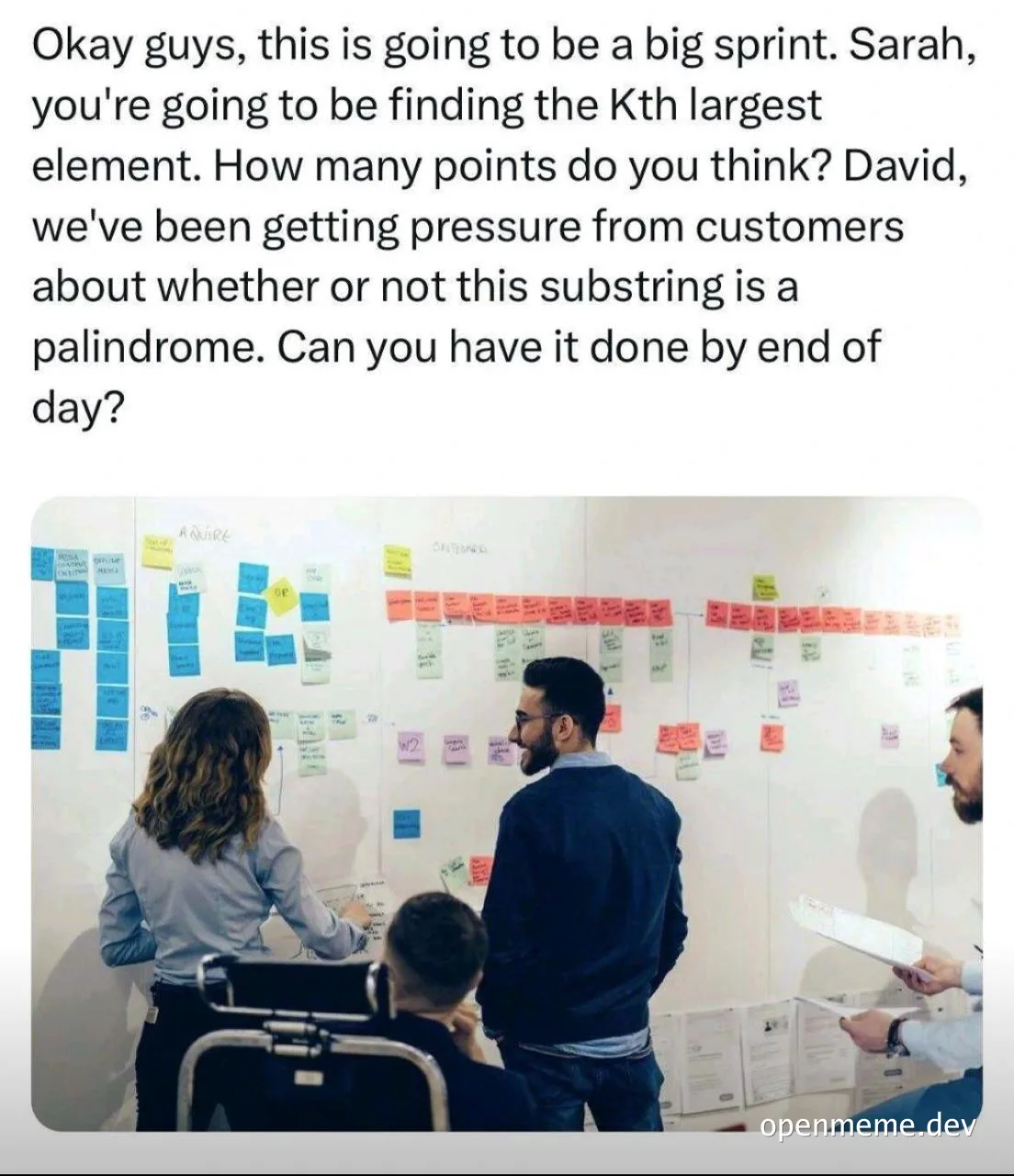 A group of developers discussing a project on a whiteboard covered in sticky notes