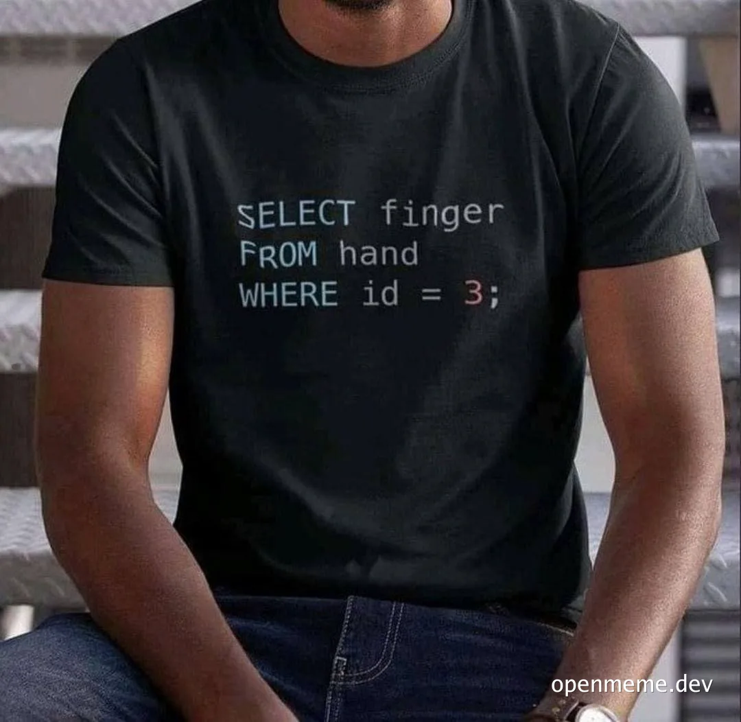 man wearing a black t-shirt with a SQL query on it