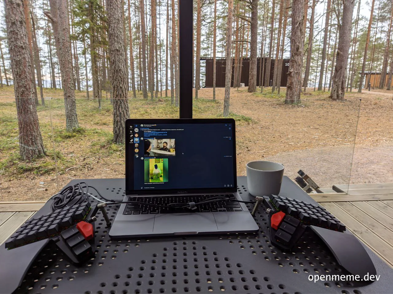 Laptop on outdoor table with ergonomic keyboard and mouse