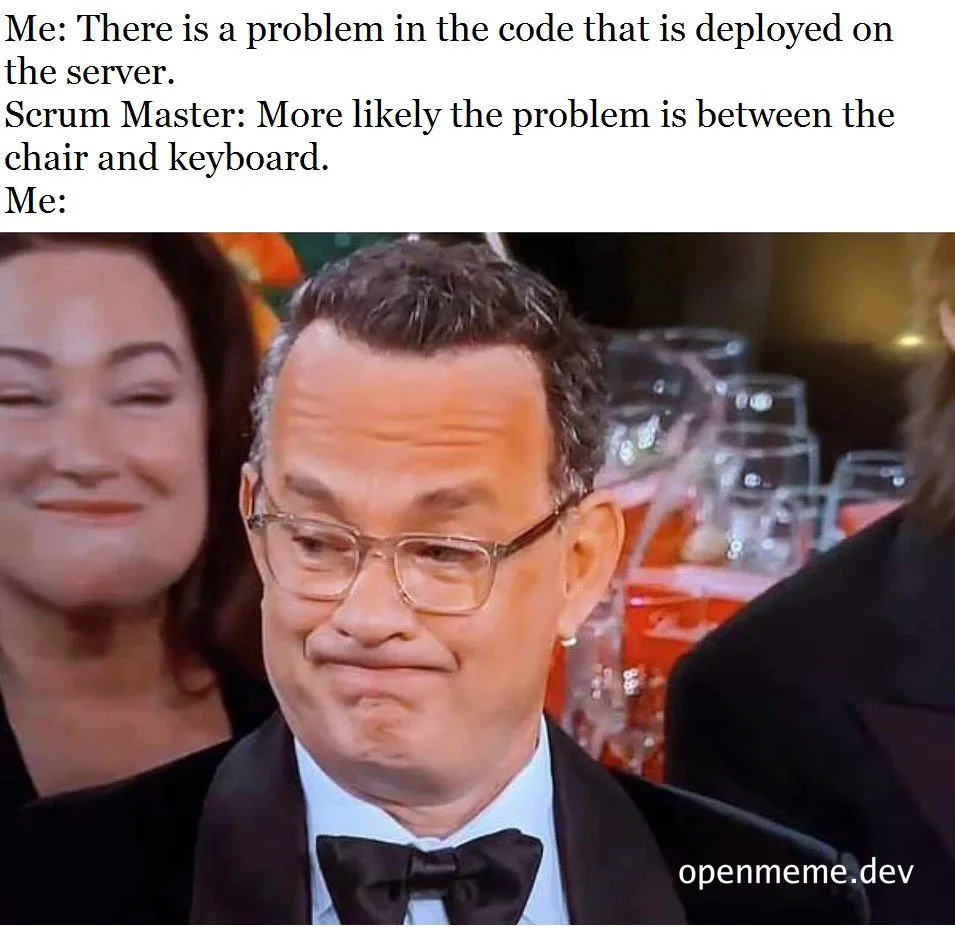 man in a tuxedo with a skeptical expression