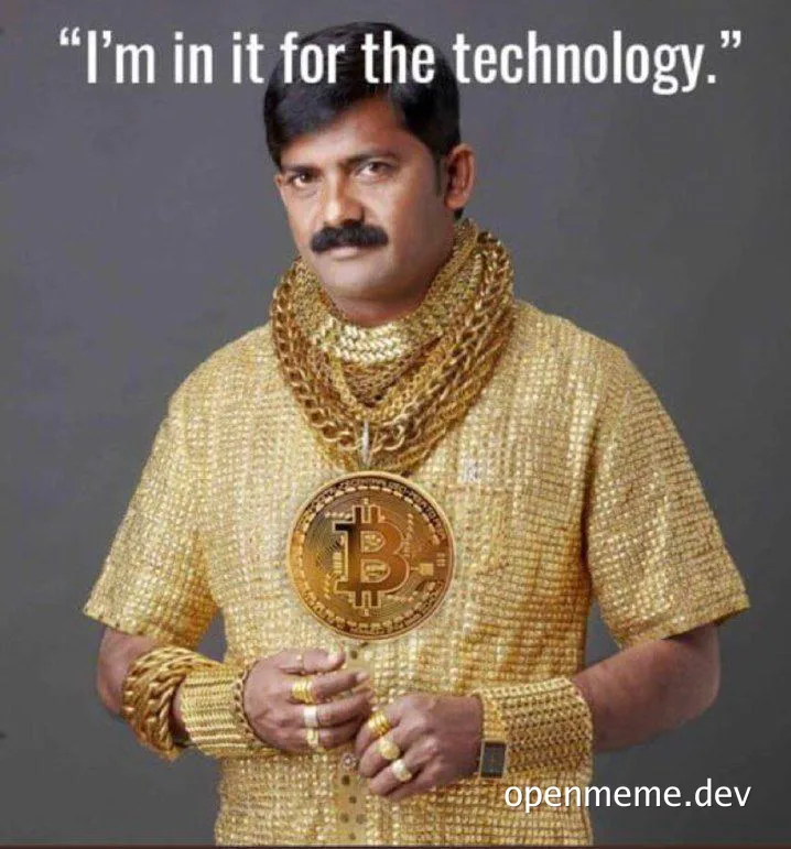 Man in gold outfit holding bitcoin, saying 'I'm in it for the technology'