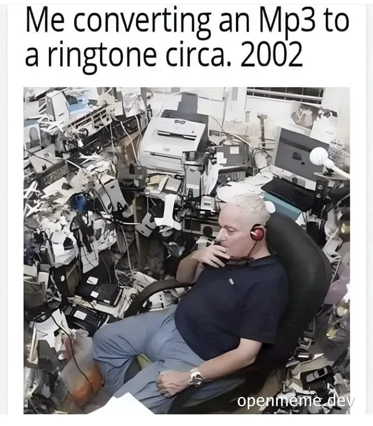 man sitting in chair surrounded by old electronics, converting mp3 to ringtone