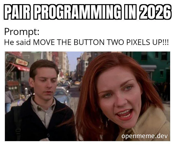 A man and an exasperated red-haired woman on a city street, captioned 'PAIR PROGRAMMING IN 2026' with the prompt 'He said MOVE THE BUTTON TWO PIXELS UP!!!'