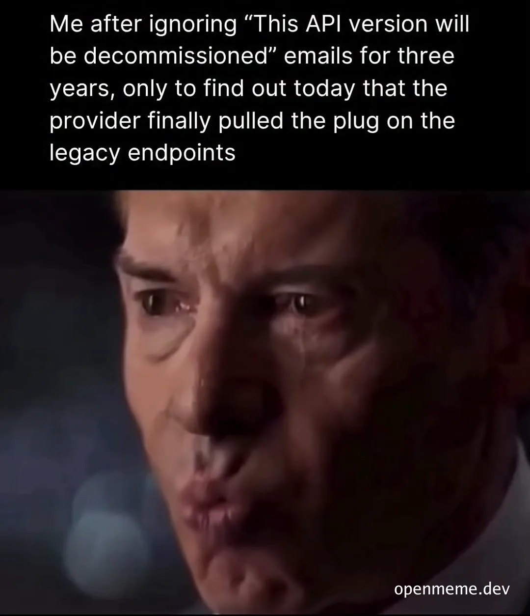 Close-up of a man with a panicked, sweating expression captioned about ignoring API decommission emails for three years