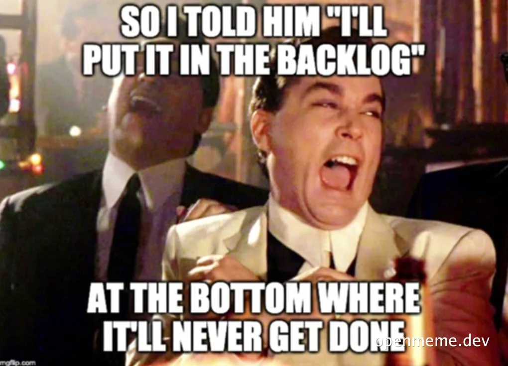 Two men in suits laughing, one saying 'SO I TOLD HIM I'LL PUT IT IN THE BACKLOG AT THE BOTTOM WHERE IT'LL NEVER GET DONE'