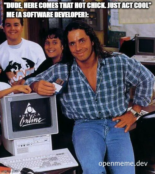 A software developer trying to act cool in front of a woman while using an old AOL computer