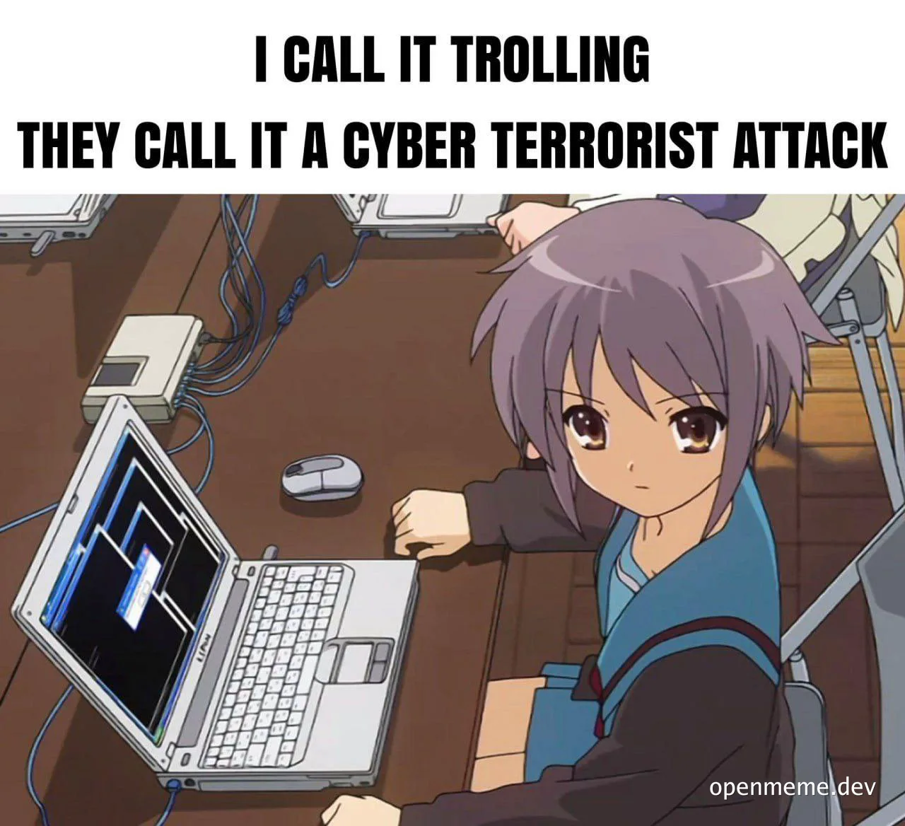 anime girl sitting at desk with laptop and caption 'I call it trolling they call it a cyber terrorist attack'