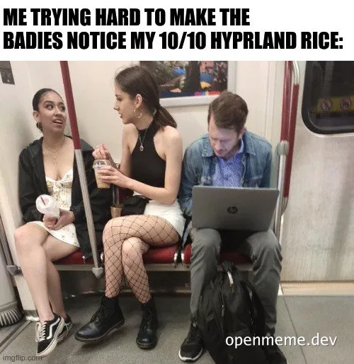 Man on train with laptop trying to impress women