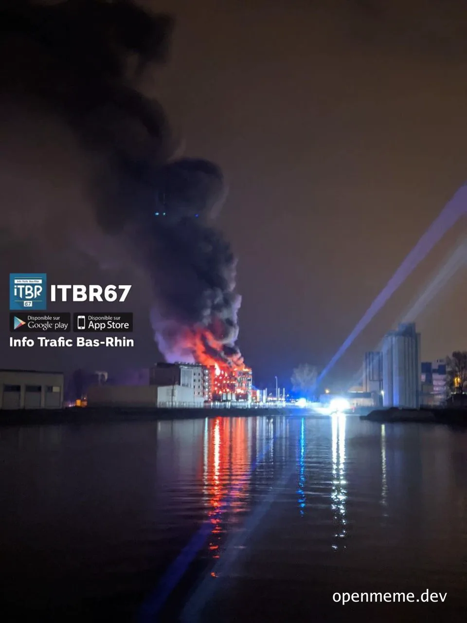 Data center fire at night with smoke and flames