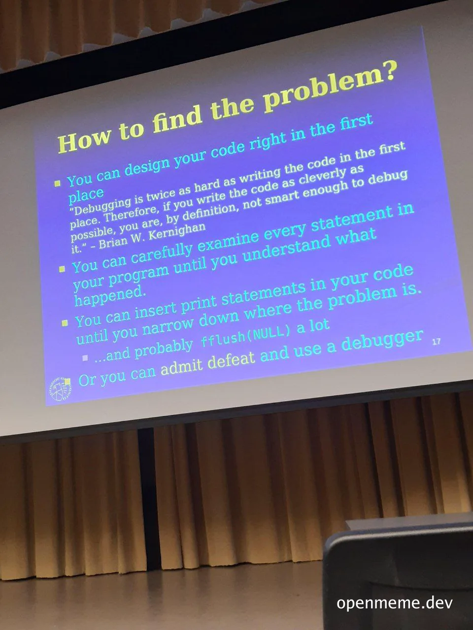 Slide from a presentation about debugging code