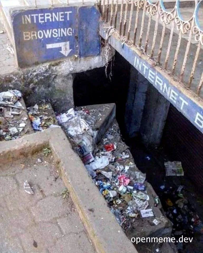 Dirty drainage tunnel with sign pointing to internet browsing