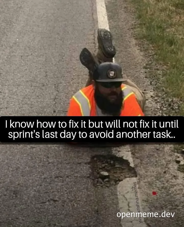 Man in orange safety vest lying on road with text 'I know how to fix it but will not fix it until sprint's last day to avoid another task.'