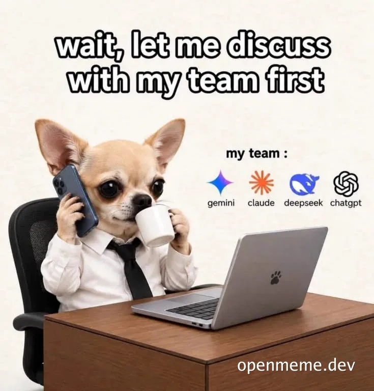 Chihuahua in a dress shirt and tie sitting at a desk with a laptop, holding a phone and coffee mug, captioned 'wait, let me
