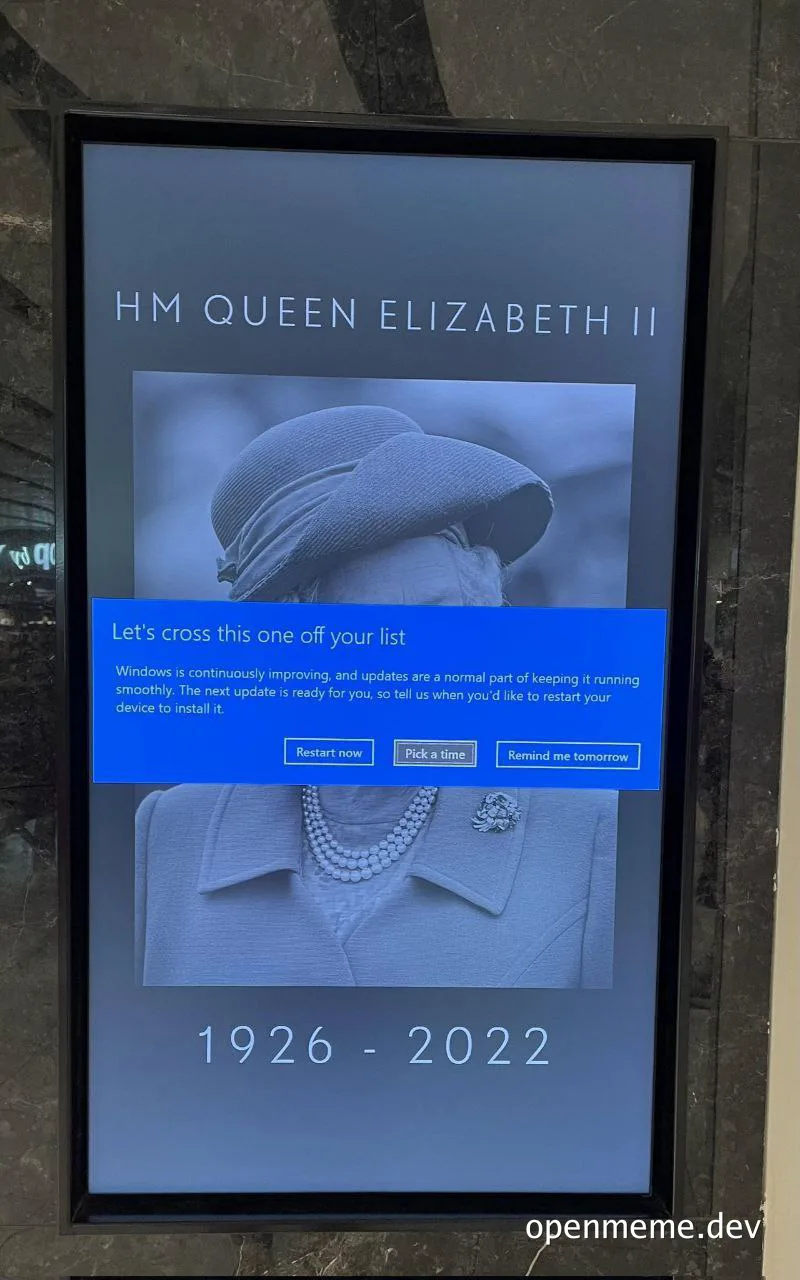 Queen Elizabeth II meme with a Windows update pop-up