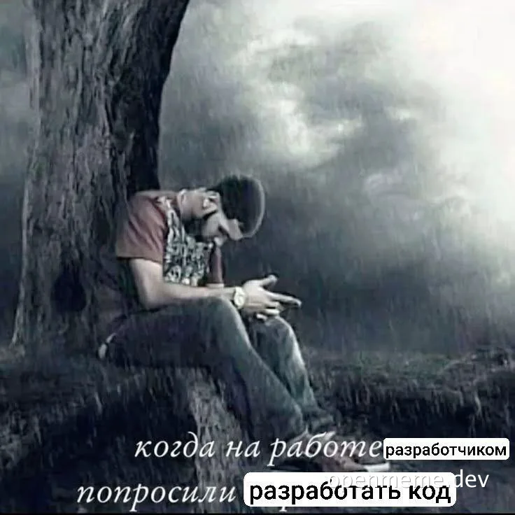 programmer sitting under tree looking stressed